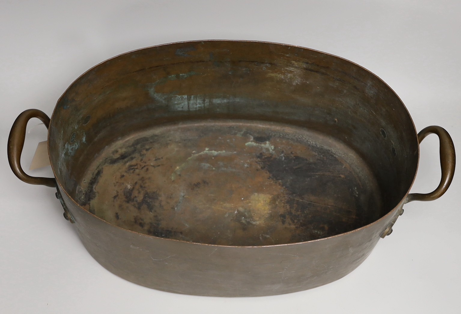 A Benham & Froud oval copper pan. 54cm wide